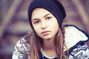A girl with a tough expression.